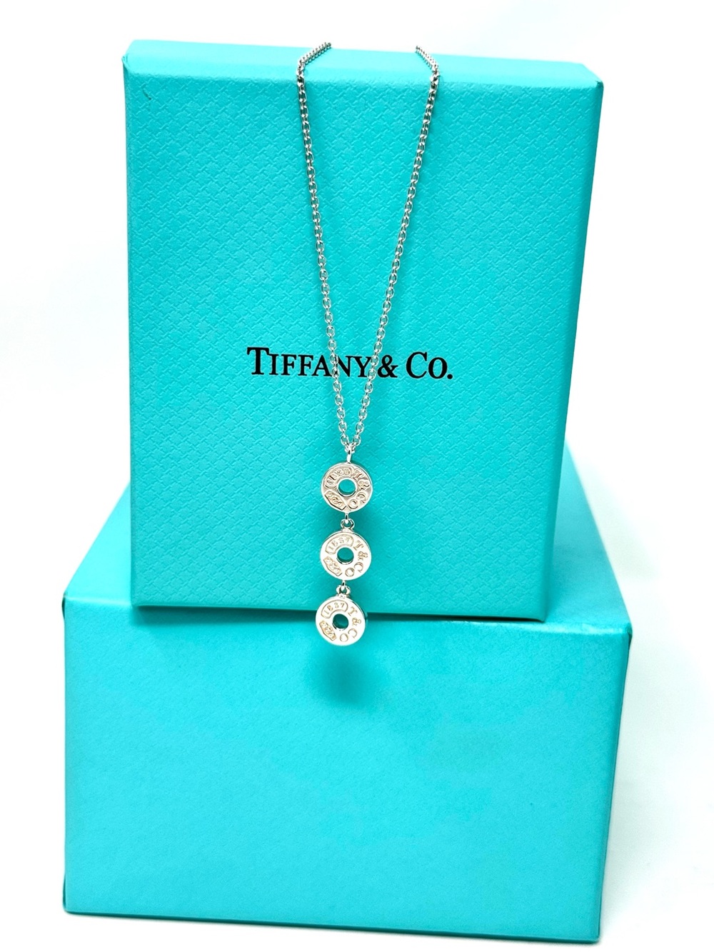 Authentic Tiffany & Co. 1837 Triple Disc Dongle Pendant Necklace.